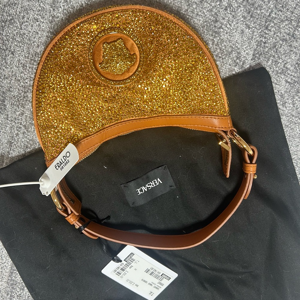 Brand new Versace shoulder bag. Never been used. Still has tags.